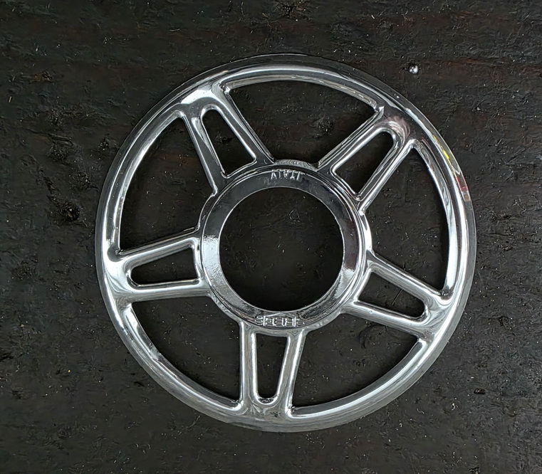 Speichenschutzscheibe, orig. 50-70er Jahre, NOS von REG/Italy, verchromt, passt hinter jeden Schraubkranz  