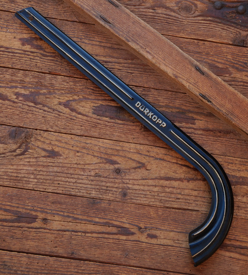 Kettenschutz, DÜRKOPP, schwarz, Linien gold, Länge ca. 53 cm, orig. 30er-50er J., restauriert 