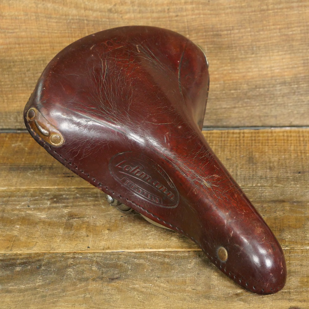Sattel, Herren, LOHMANN Mod. 208, 50er J., für Sportrad, Leder braun, Gestell verchromt, gebr. 