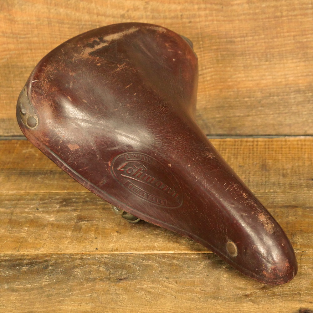 Sattel, Herren, LOHMANN Mod. 208, 50er J., für Sportrad, Leder braun, Gestell verzinkt, gebr. 