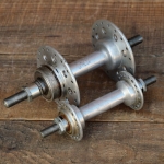 Nabensatz Fahrrad OFMEGA, Alu Hochflansch, 70er J., Einbaumaße ca. 98mm/117mm, 36 Loch, gebr. 