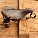 Sattel, Herren, WIKO, 20er/30er J., für Tourenrad, Leder braun, Gestell vernickelt, gebr. 