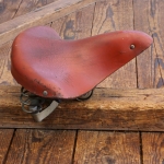 Sattel MÖVE/IFA, Damen, für Tourenrad, Leder orangebraun, Gestell verzinkt, DDR 70er/80er J., gebr. 