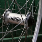 Vorderrad, 26 Zoll (559), um 2000, ALESA Voyager-Felge Alu, Nabe: SHIMANO Deore, NOS 