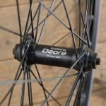 Vorderrad mit Alu Hohlkammer-Felge, 26 Zoll (559), schwarz, 1990/2000er J., SHIMANO Deore-Nabe, gebr. 