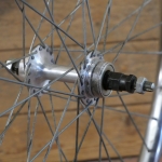 Hinterrad 22 x 1 3/8 (489) für Drahtbereifung, original 80er/90er J., SCHÜRMANN Felge, Nabe: SACHS-MAILLARD, NOS 