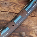 Fahrrad-Wulstfelge 28 Zoll Außendurchmesser ca. 645 mm, 20er/30er J., schwarz, Linien blau/weiß, gebr. 