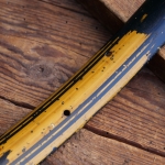 Fahrrad-Wulstfelge 28 Zoll Außendurchmesser ca. 645 mm, 20er/30er J., Holzdekor, Linien schwarz, gebr. 