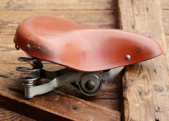 Sattel MÖVE/IFA, für Kinder-/Jugendrad, Leder, orangebraun, Gestell chromatisiert, orig. DDR 60er-80er J., gebr. 