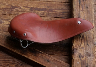 Sattel MÖVE/IFA, Herrenform für Sportrad, Leder, orange-braun, Gestell chromatisiert, original DDR 60er-80er J., gebr. 