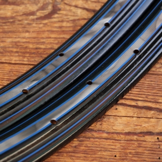 Felgensatz, 26 Zoll (559), schwarz, Linien blau, Mitte weiß geflammt, für WANDERER Ballonrad, 30er J., NOS 