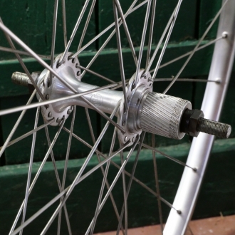 Hinterrad 28 Zoll (622), 1986, SCHÜRMANN Alu-Felge für Drahtreifen,  MAILLARD Helicomatic-Nabe, NOS 