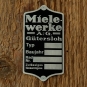 Typenschild für "MIELE Motorfahrrad / 98er SACHS", silber/schwarz, für Rahmenmontage, 35x67mm
